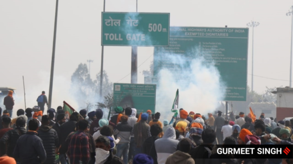 Indian police fire tear gas as protesting farmers march to capital